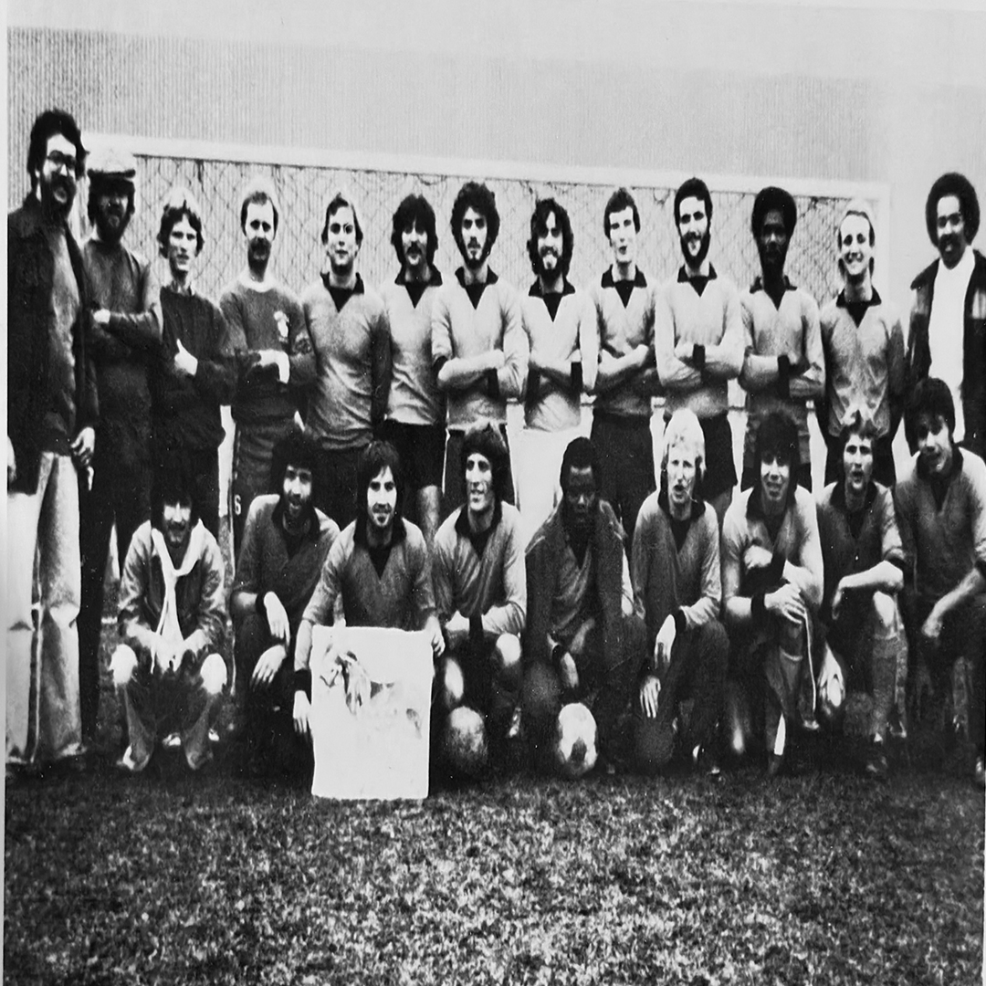 A black and white photo of the 1979/80 Men's Soccer Team. 