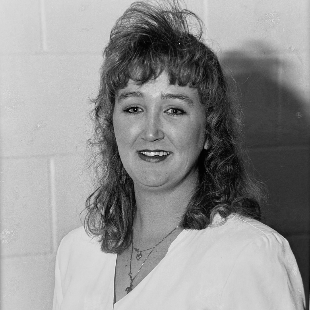 A black and white headshot of Cathy Ryan. 