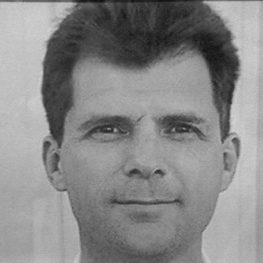 A black and white headshot of Michael A Fortuna. 