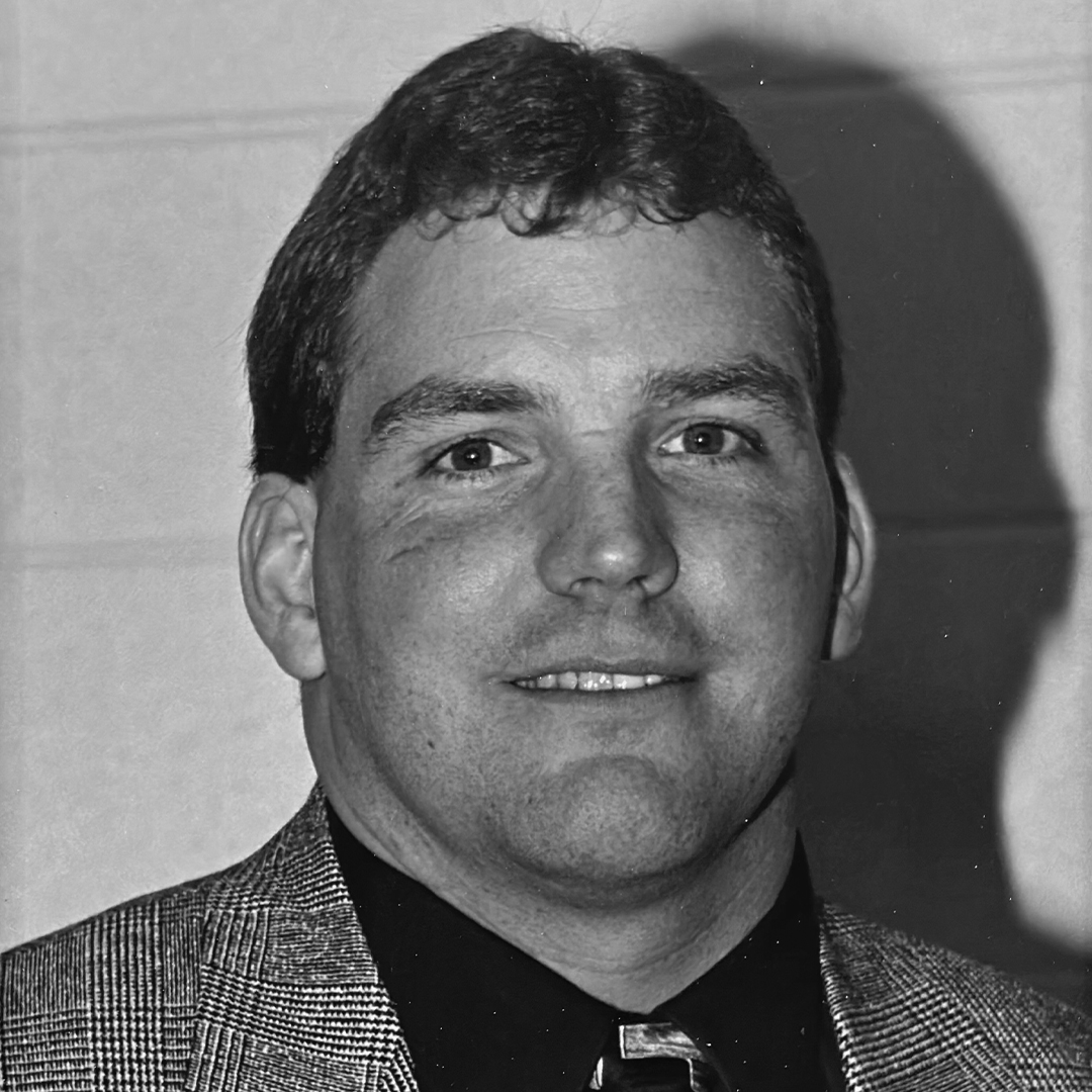 A black and white headshot of Scott Long. 